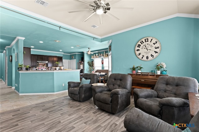 3700 Joyce Ln, Killeen, TX 76549 - living area with a ceiling fan, crown molding, light wood-type flooring, and recessed lighting