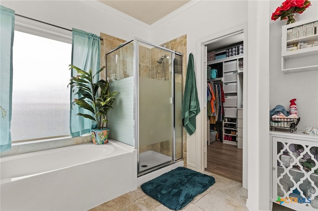 3700 Joyce Ln, Killeen, TX 76549 - bathroom featuring a stall shower, a bath, and a spacious closet
