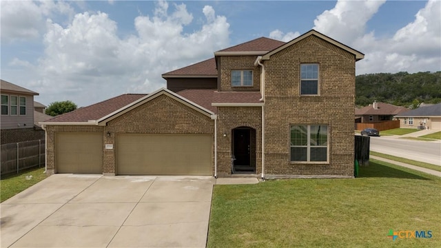 3700 Joyce Ln, Killeen, TX 76549 - traditional home featuring brick siding, concrete driveway, an attached garage, and a shingled roof