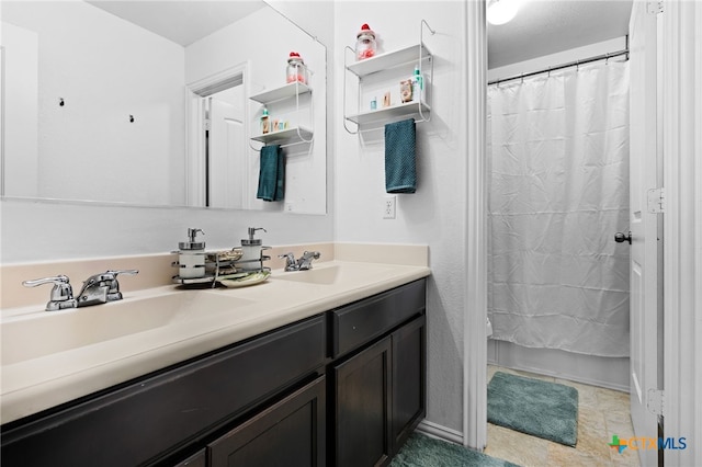 3700 Joyce Ln, Killeen, TX 76549 - bathroom with double vanity and curtained shower