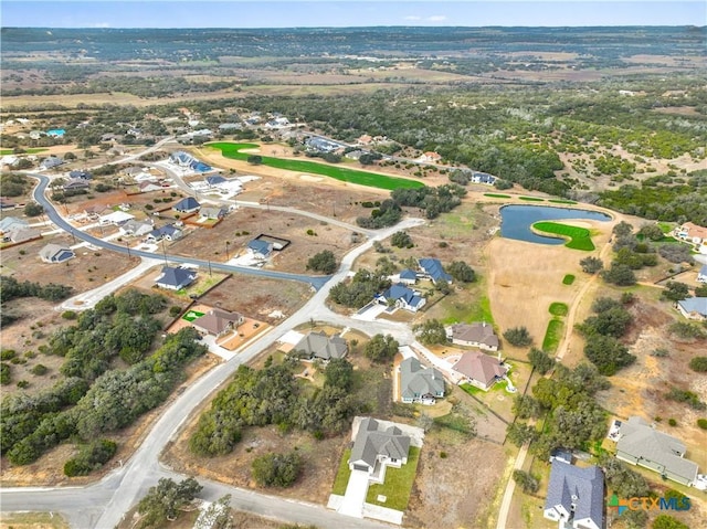 birds eye view of property with a residential view