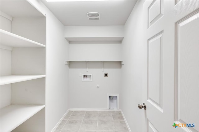 9019 Stonehollow Rd, Temple, TX 76502 - laundry area with hookup for an electric dryer, gas dryer hookup, hookup for a washing machine, and baseboards