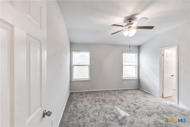 9019 Stonehollow Rd, Temple, TX 76502 - unfurnished room with carpet floors, a ceiling fan, baseboards, and vaulted ceiling