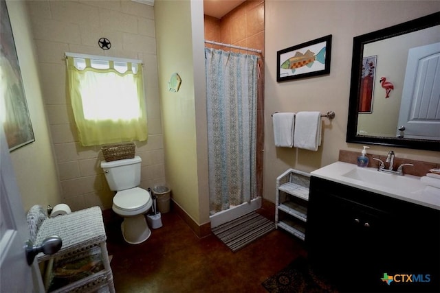 bathroom featuring baseboards, vanity, toilet, and a shower stall