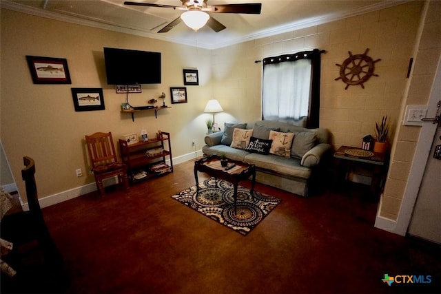 living room with baseboards, ceiling fan, and ornamental molding