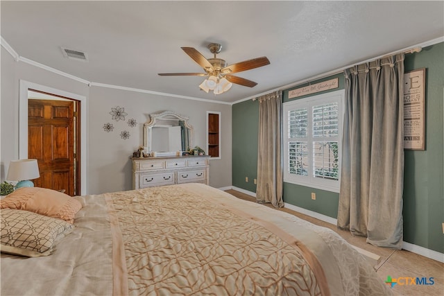 tiled bedroom featuring ceiling fan and crown molding