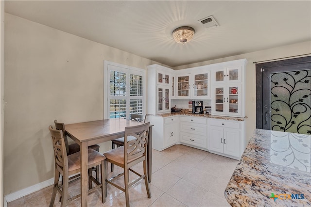 view of tiled dining area