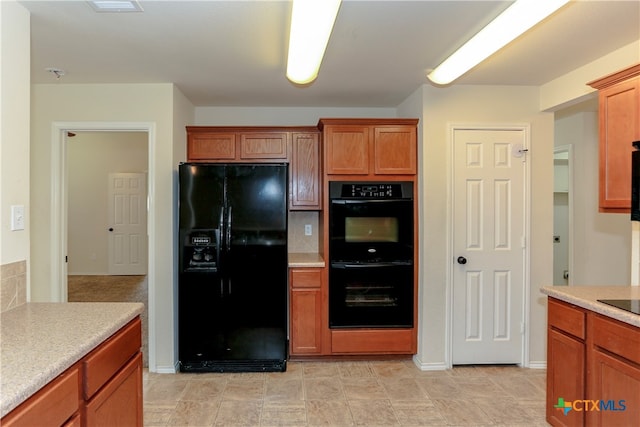 kitchen featuring black appliances