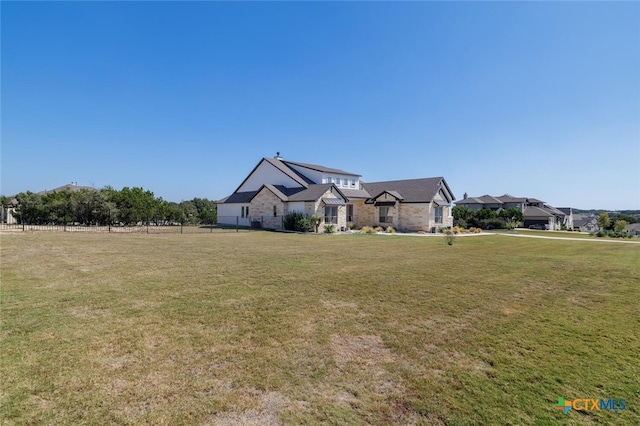 view of front of house featuring a front lawn