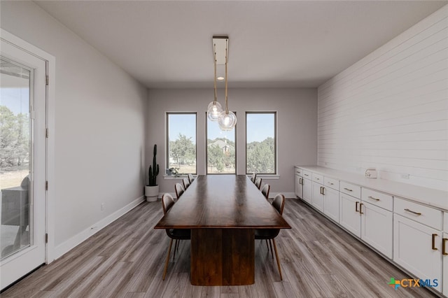 dining area with light wood-type flooring