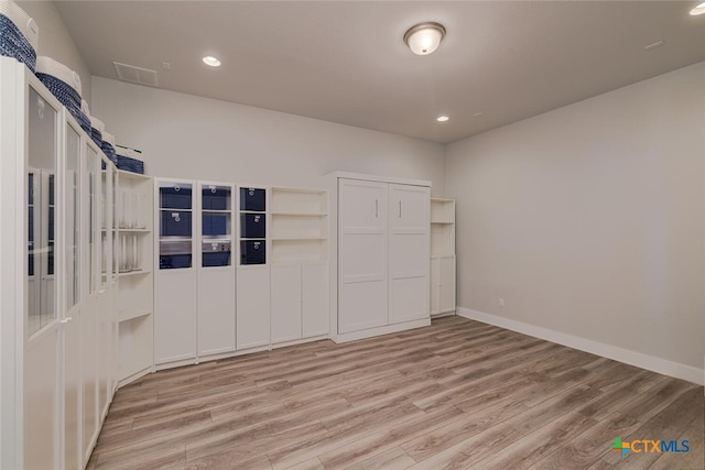 empty room with light wood-type flooring