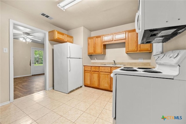 804 Little St, Copperas Cove, TX 76522 - kitchen with white appliances, light countertops, ceiling fan, and light tile patterned flooring