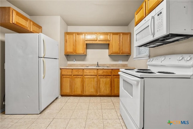 804 Little St, Copperas Cove, TX 76522 - kitchen featuring white appliances, light countertops, and light tile patterned flooring