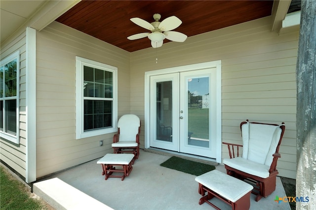 view of patio featuring ceiling fan