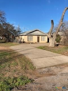 view of front of house featuring concrete driveway