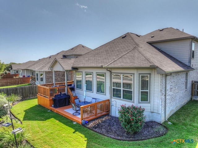 3214 Roan St, New Braunfels, TX 78130 - back of property with a fenced backyard, a wooden deck, and roof with shingles