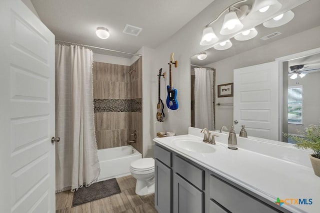3214 Roan St, New Braunfels, TX 78130 - bathroom with vanity, shower / bathtub combination with curtain, and a ceiling fan