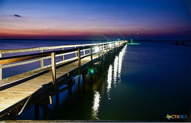 dock area featuring a water view