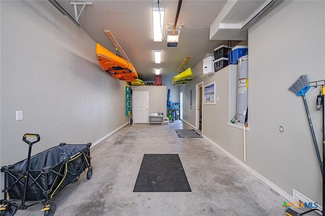 garage with baseboards and a garage door opener