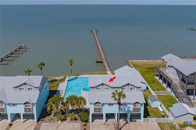 bird's eye view with a residential view and a water view