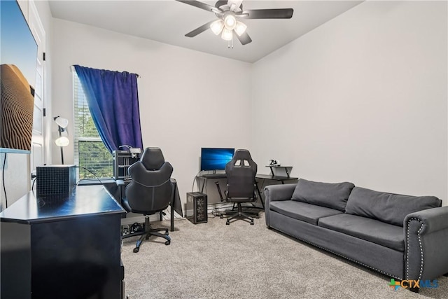 home office with carpet floors and ceiling fan