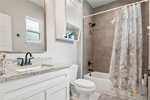 full bathroom with vanity and shower / tub combo