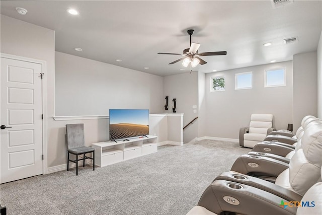 living area featuring carpet flooring, ceiling fan, and recessed lighting