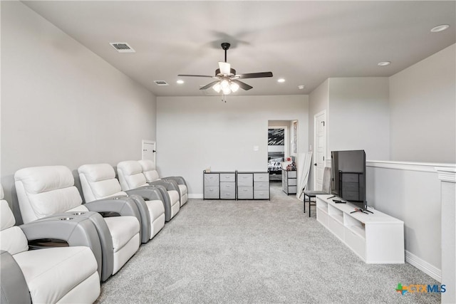 carpeted cinema with a ceiling fan and recessed lighting