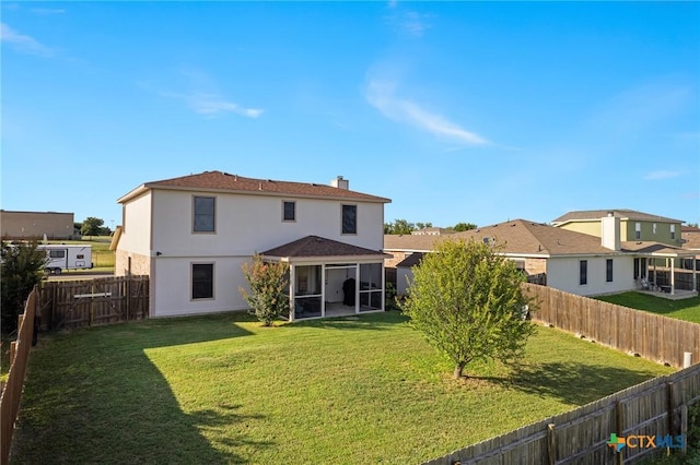 2604 Mikulec Dr, Killeen, TX 76542 - back of property with a sunroom, a fenced backyard, a chimney, and stucco siding