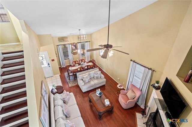 2604 Mikulec Dr, Killeen, TX 76542 - living area featuring stairs, wood finished floors, and a ceiling fan