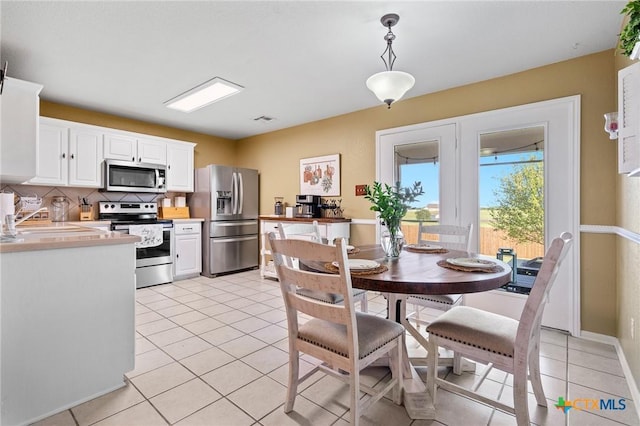 2604 Mikulec Dr, Killeen, TX 76542 - dining room with light tile patterned floors