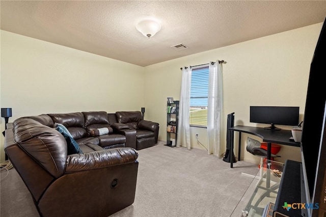 2604 Mikulec Dr, Killeen, TX 76542 - living room featuring a textured ceiling, an office area, and carpet flooring