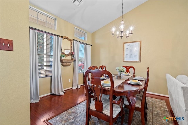2604 Mikulec Dr, Killeen, TX 76542 - dining area featuring a chandelier, high vaulted ceiling, and wood finished floors
