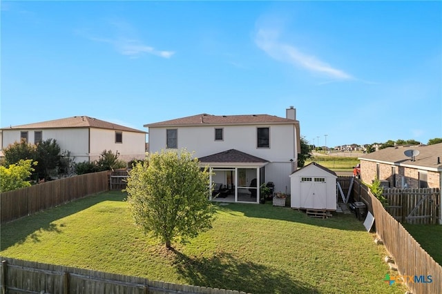 2604 Mikulec Dr, Killeen, TX 76542 - rear view of property with a shed, a sunroom, a fenced backyard, and a chimney
