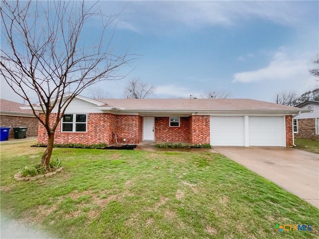 ranch-style home with a garage, driveway, a front lawn, and brick siding