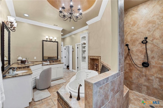 bathroom featuring independent shower and bath, vanity, ornamental molding, a raised ceiling, and a chandelier