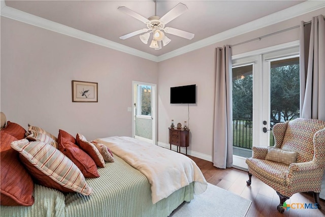 bedroom with multiple windows, ceiling fan, light hardwood / wood-style flooring, and access to outside