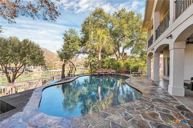 view of pool featuring a patio area