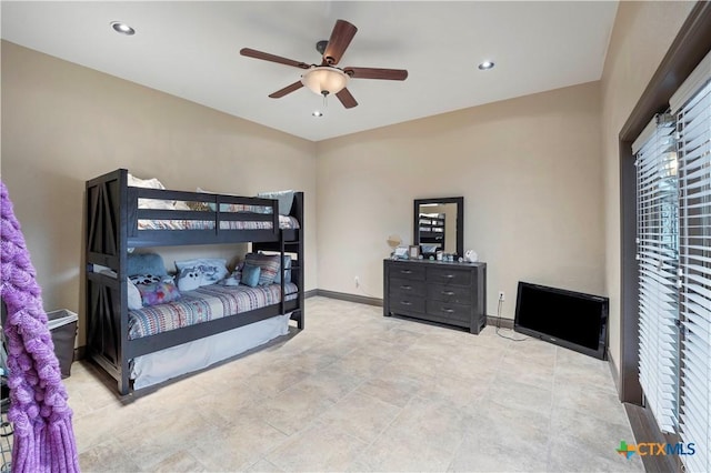 bedroom featuring ceiling fan