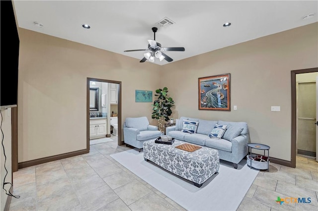 living room with ceiling fan