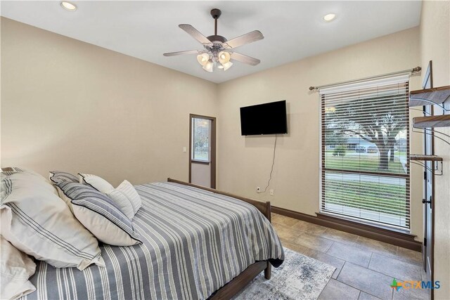 bedroom featuring ceiling fan