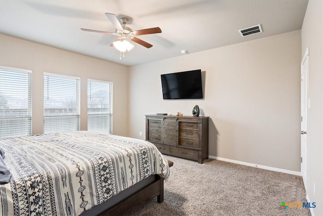 carpeted bedroom with ceiling fan