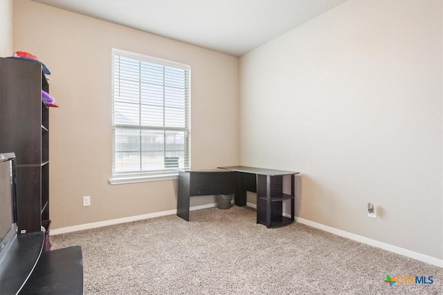 view of carpeted home office