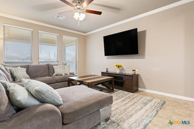 living room with ornamental molding and ceiling fan