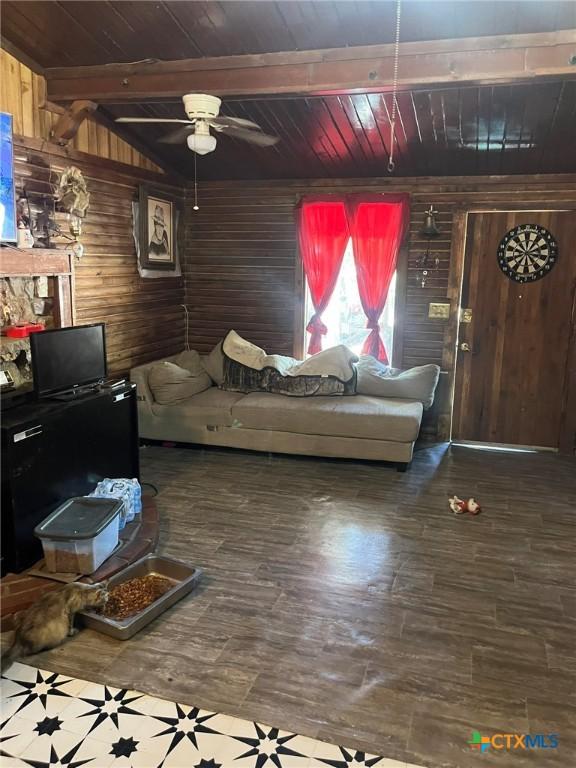 304 Kegley St, Belton, TX 76513 - living area with hardwood / wood-style floors, wooden walls, wooden ceiling, and a ceiling fan