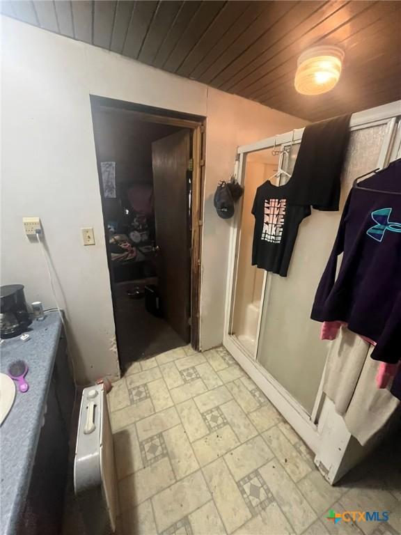 304 Kegley St, Belton, TX 76513 - bathroom with wooden ceiling and a stall shower