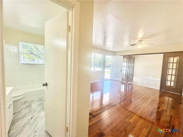 909 S 23rd St, Copperas Cove, TX 76522 - spare room with a ceiling fan, baseboards, and wood finished floors