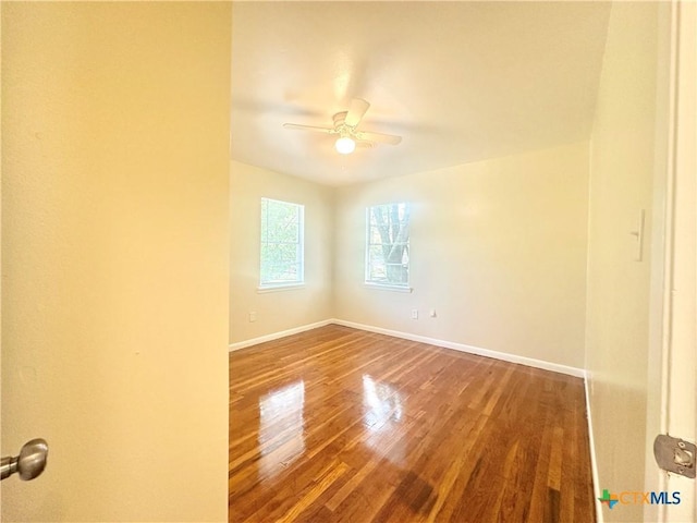 909 S 23rd St, Copperas Cove, TX 76522 - spare room featuring wood finished floors, a ceiling fan, and baseboards