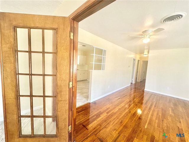 909 S 23rd St, Copperas Cove, TX 76522 - empty room featuring hardwood / wood-style flooring, a ceiling fan, and baseboards