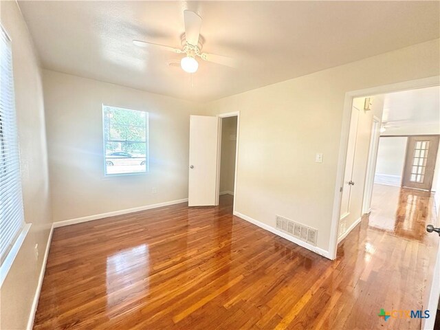 909 S 23rd St, Copperas Cove, TX 76522 - unfurnished room with ceiling fan, wood finished floors, and baseboards